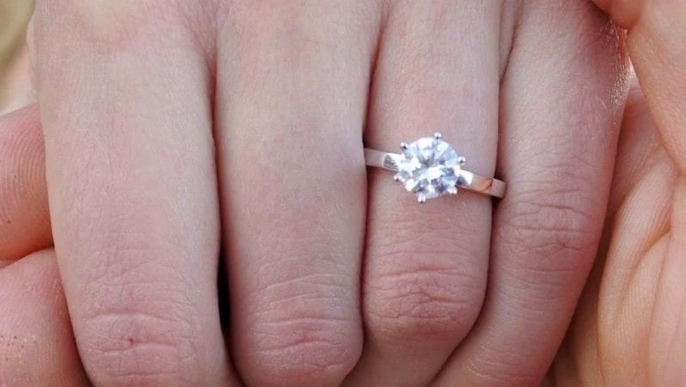 He proposed to her with a diamond ring, she accepted and was in ninth heaven