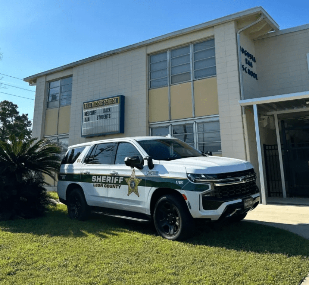 Photo Of Florida Deputy At Football Game Turns Heads, When You Zoom Out You’ll Realize Why