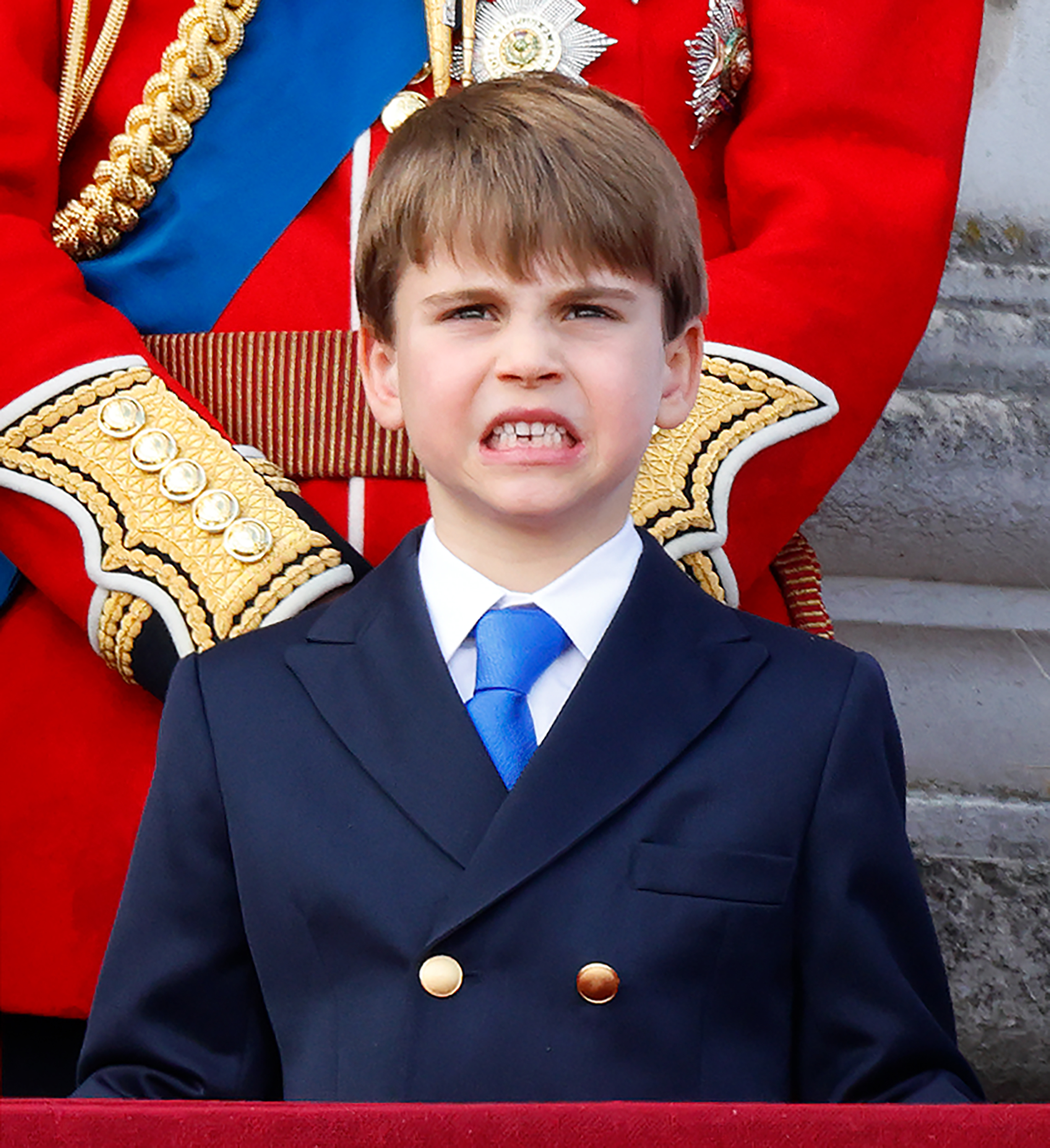 Prince Louis smiles during RAF flypast from the balcony of Buckingham Palace