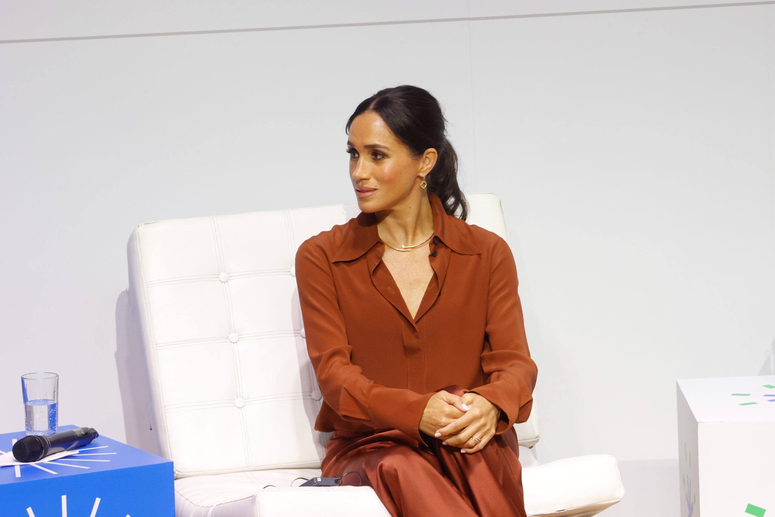 Meghan Markle sits on a couch during a forum in Bogota, Colombia