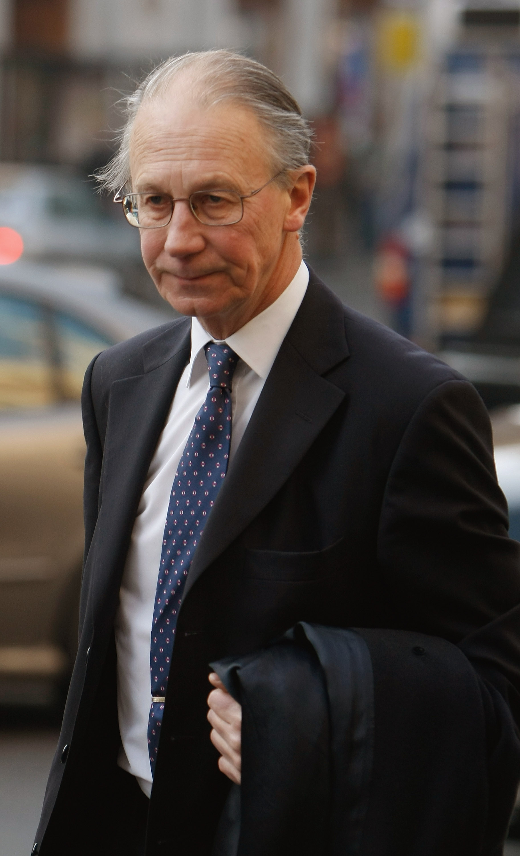 Lord Robert Fellows arrives to the High Court on February 12, 2008, in London, England. | Source: Getty Images